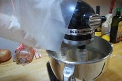 Pouring Flour The wax paper makes pouring the flour into the mixer easy.