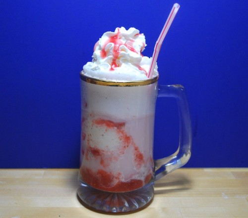 Strawberry Soda Layered with freshly made strawberry syrup and vanilla ice cream.