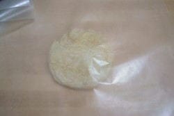 Wax paper Place the ball between wax paper and roll out