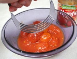 I like my sauce chunky so opted to chop up the tomatoes by hand.