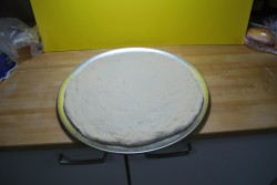 Form the dough onto the pan or peel Form the dough onto the pan or peel