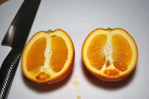 I used navel oranges as that is all that I could find this time of year.  Make sure cut them lengthwise through the stem.