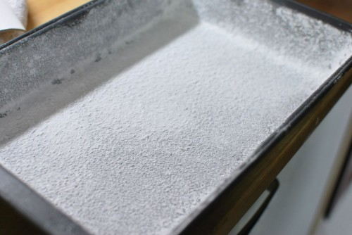 Dust the pan heavily Dust the pan heavily