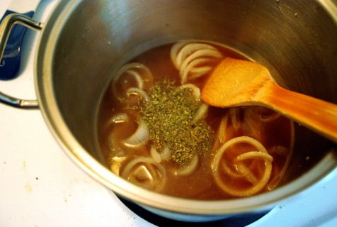 Add the broth and spices