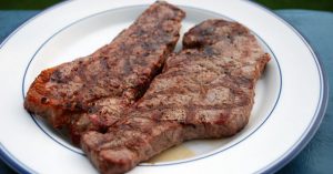 NY strips with bourbon steak sauce