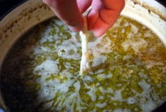 Add the stock and add the noodles