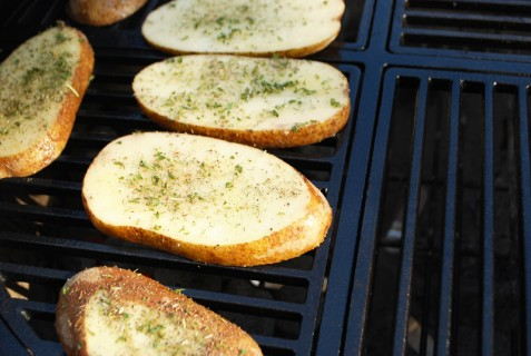 Place the taters onto the grill Place the taters onto the grill