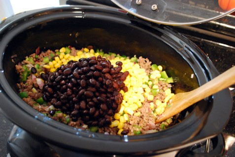 Add the corn and beans Add the corn and beans
