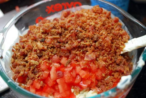 Add the bacon, blue cheese and tomatoes Add the bacon, blue cheese and tomatoes