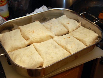 Fill the greased pan